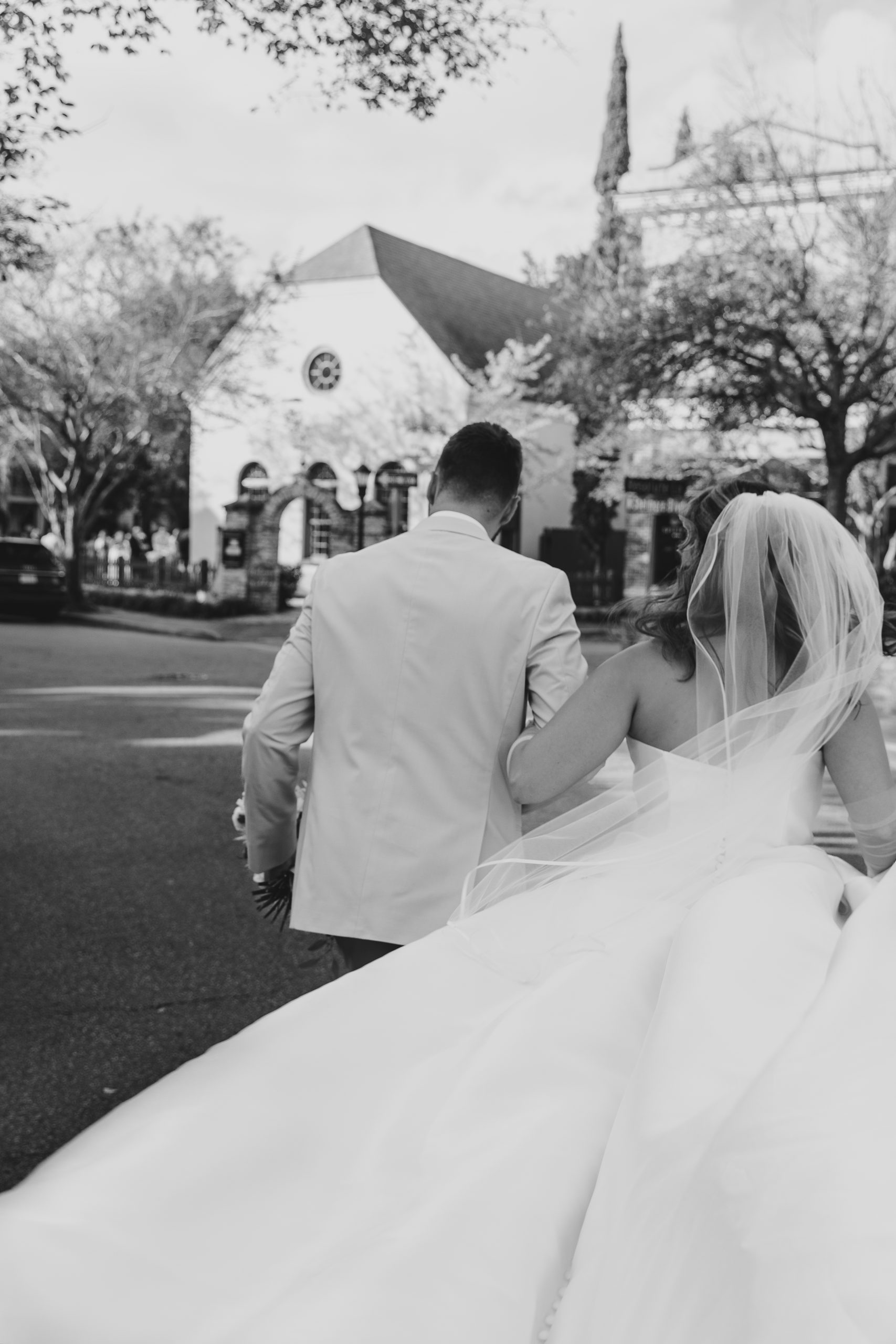 Charleston wedding photographer captures bride and groom headed to the I'On Chapel for their wedding. 