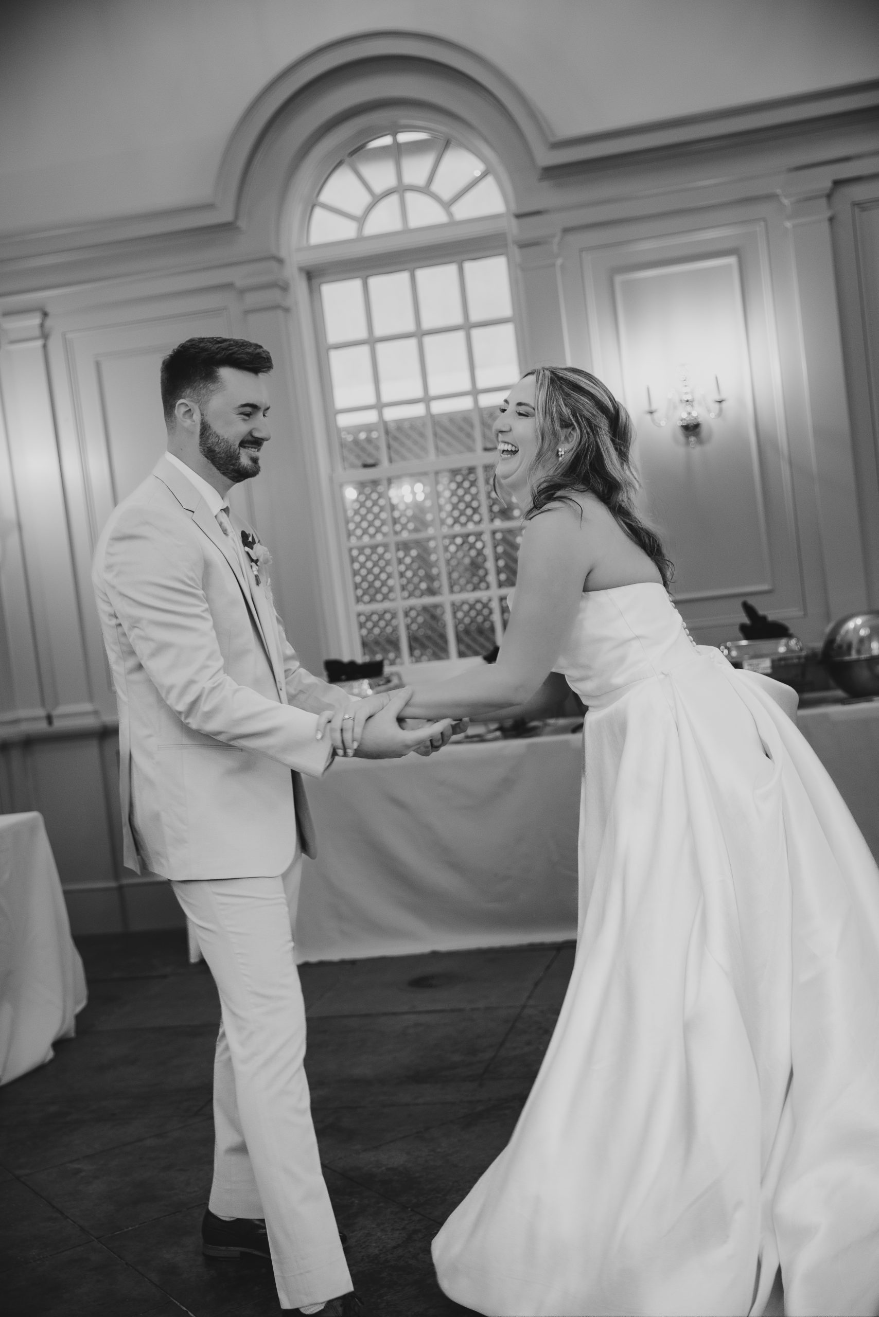 Charleston wedding photographer captures bride and grooms first dance at the chapel at I'On. 